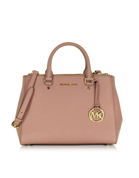 michael kors sutton satchel pink|Michael Kors pink studded purse.